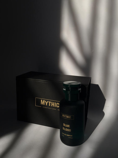 Black bottle labeled 'Mythic' with a matching box on a dark background
