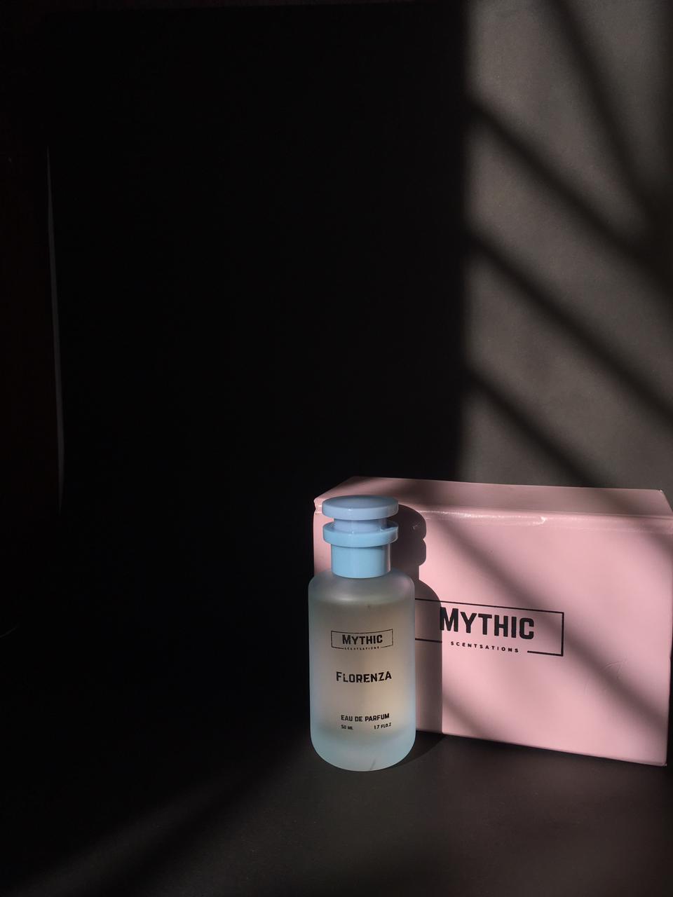 Mythic Florence perfume bottle with packaging on a dark background